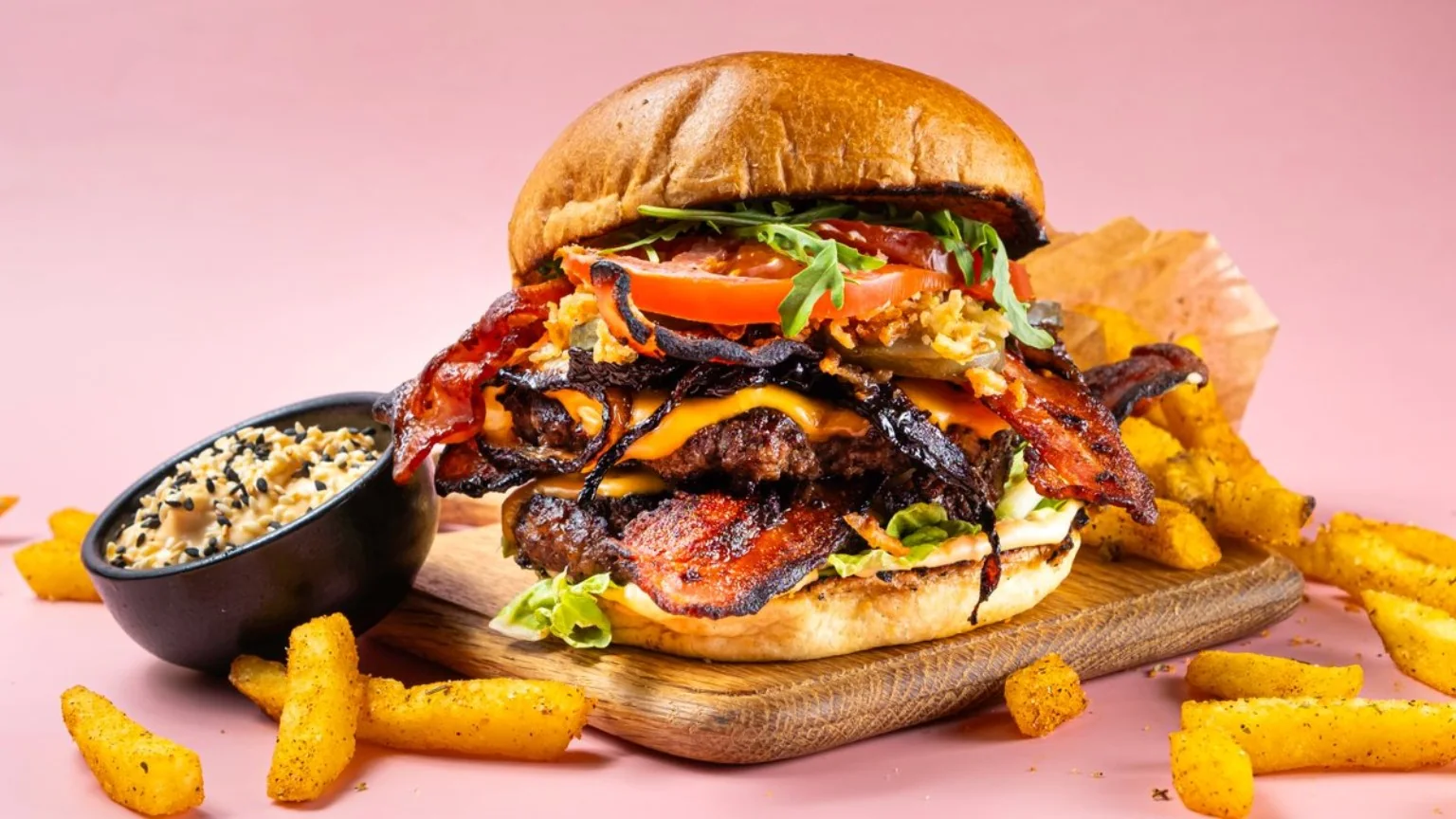 Baking Mad Hidden Lab burger with bacon, cheese and salad