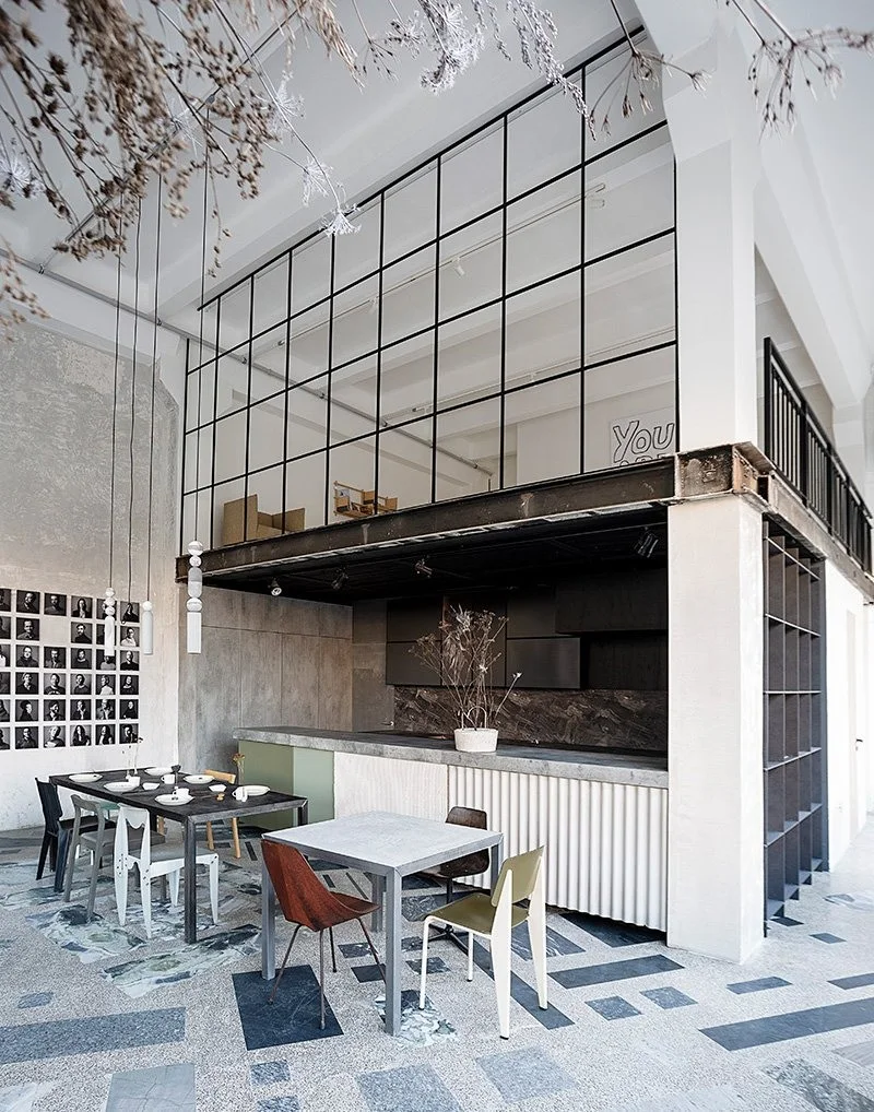 The industrial-style dining space at Demoloftas.