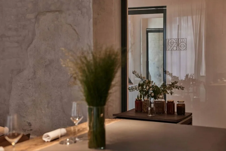 A table beside the window in the Nineteen18 dining room.