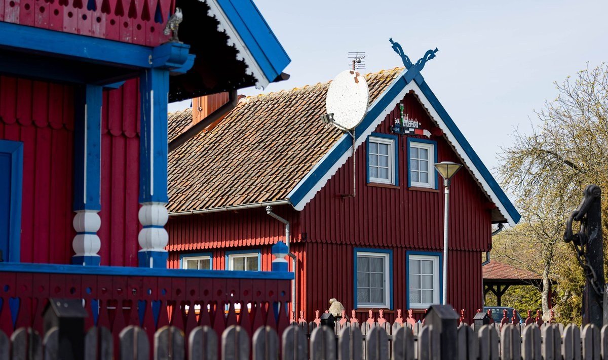Traditional red and blue fishermen's houses in Nida